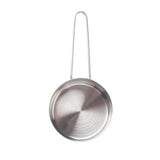 A small stainless steel saucepan with a brushed metal finish is seen from above. It features a round, flat base and a long, thin, looped handle extending upward for a minimalist design. This side server is also dishwasher safe.