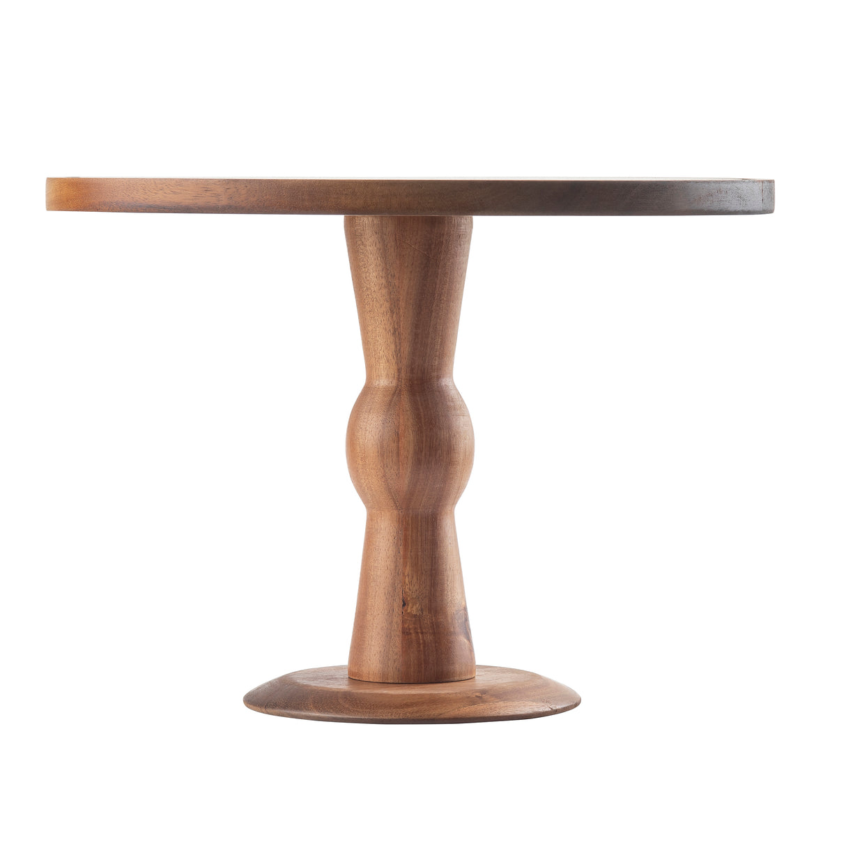 A round Acacia Cake Plate featuring a smooth, flat top and a single, sculpted pedestal base. The wood cake plate’s natural finish highlights the grain, while the decorative base sits on a wide circular foot against a plain white background.