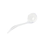 A clear, curved polystyrene spoon with a round, deep bowl and a slightly bent handle, placed on a white background. Lightweight like a mini ladle, it’s designed for scooping or serving small portions.