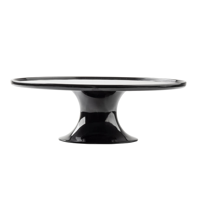 A glossy black ceramic cake stand from the Crofthouse Collection features a wide, flat top and flared pedestal base. Its smooth, shiny surface and minimalist design are showcased on a plain white background.