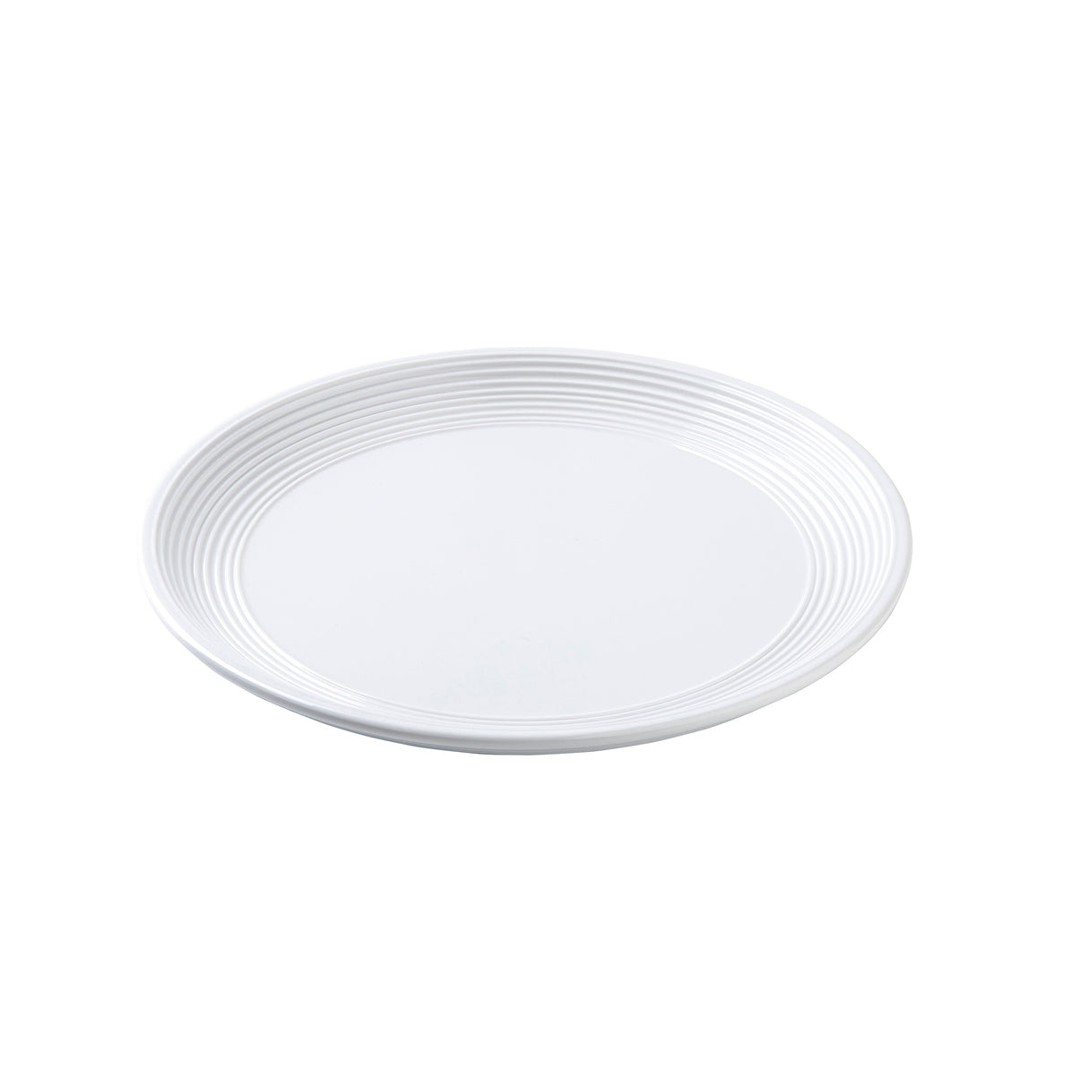 A plain white, round TableCraft Pulito Collection Plate with subtle concentric ridges near the rim, shown on a white background. The plate appears clean and empty, featuring a simple and minimalist design.