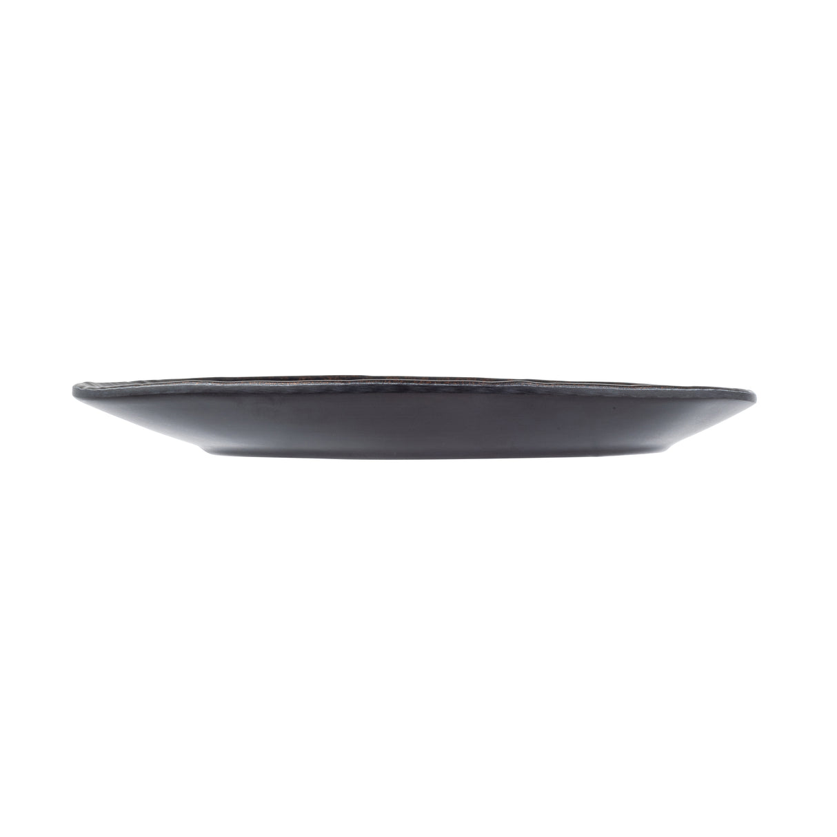A black Lunara Collection Serving Plate by TableCraft Products is viewed from the side against a white background. The round, flat melamine serving plate features a thin, smooth rim and minimalist, modern design that highlights its low profile.
