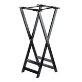 A black metal luggage rack with four horizontal support straps and X-shaped angled legs. This lightweight, foldable tray stand is ideal for holding suitcases or bags, making it perfect for hotels or guest rooms.