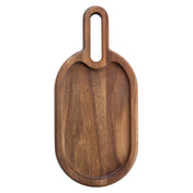 A wooden serving board with an oval shape, slightly recessed center, and a rounded handle featuring a large oval cutout. Crafted from rich Acacia wood, this Acacia snack tray offers a simple, functional design perfect for TableCraft Products lovers.
