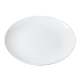 A plain, round, white ceramic plate is shown against a solid white background. Reminiscent of the Sierra Collection Serving Platter, it has a smooth surface with slightly raised edges and no visible patterns or decorations.