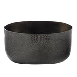 A round, deep, black aluminum bowl with a textured, hammered pattern covering its exterior and interior. The bowl has smooth edges and a matte finish, giving it a modern, minimalist appearance perfect for the Crackle Collection.