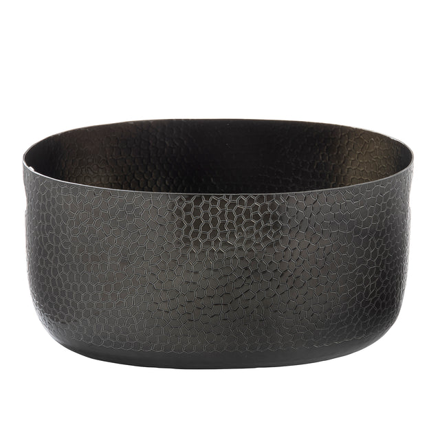 A round, deep, black aluminum bowl with a textured, hammered pattern covering its exterior and interior. The bowl has smooth edges and a matte finish, giving it a modern, minimalist appearance perfect for the Crackle Collection.
