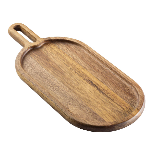 A wooden cutting board from the TableCraft Acacia Collection features an oval shape, slightly raised edge, and handle with a cut-out hole for hanging. The natural wood grain of this Acacia Serving Tray is beautifully showcased on a white background.