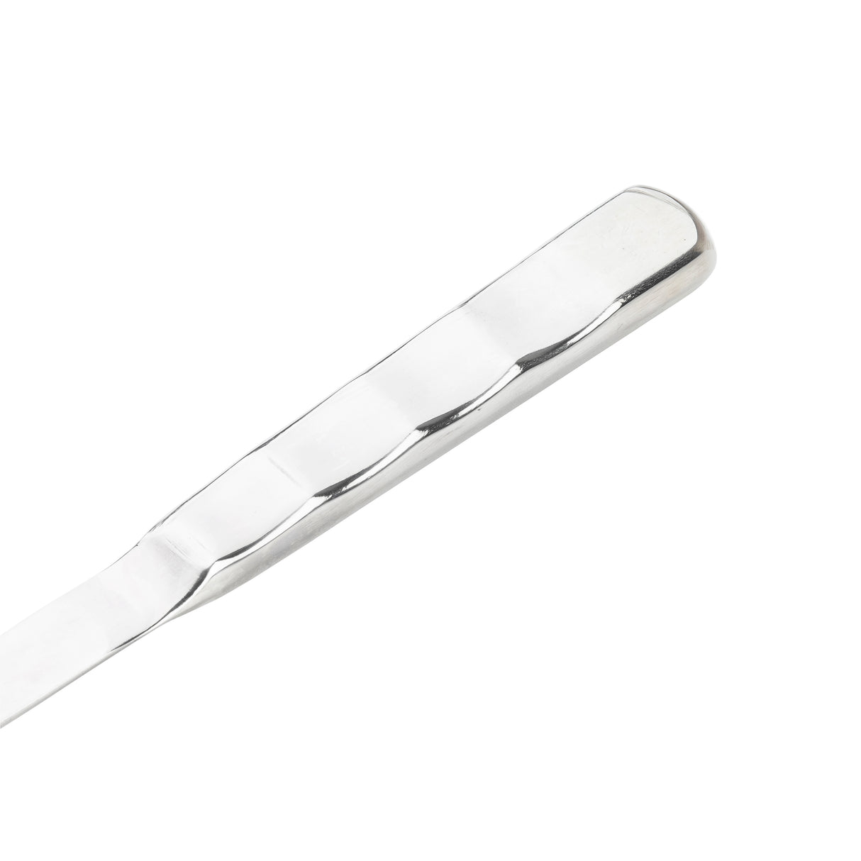 A close-up of a shiny, silver metal handle from the Holden Collection Solid Spoon, featuring gentle, evenly spaced grooves and a smooth, reflective finish. The elegant stainless steel spoon rests against a plain white background.