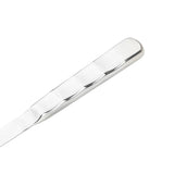 A close-up of a shiny, silver metal handle from the Holden Collection Solid Spoon, featuring gentle, evenly spaced grooves and a smooth, reflective finish. The elegant stainless steel spoon rests against a plain white background.