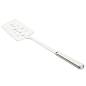 A Holden Collection Slotted Turner by TableCraft Products, this stainless steel turner features a flat, rectangular slotted blade with decorative cut-out patterns and a long handle. The angled spatula displays its reflective metallic surface against a white background.