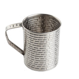 The TableCraft Products Brickhouse Collection Mug is a 16 oz stainless steel mug featuring a woven, basket-like textured pattern and a matching handle. Its cylindrical, reflective design stands out against a plain white background.