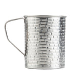 A silver metal cup from TableCraft Products' Brickhouse Collection, this 16 oz stainless steel mug features a brick-like textured pattern, a round rim, and a simple wire handle on the left side, set against a plain white background.