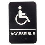 A black rectangular accessible sign with a white wheelchair symbol above "ACCESSIBLE" in bold capitals. The polystyrene sign also features braille beneath the text for visually impaired accessibility.