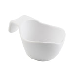A plain white ceramic sauce boat with a curved spout and an elevated, ergonomic handle, photographed on a white background. The smooth, minimalist design is dishwasher safe and perfect for serving condiments or dipping sauces.