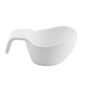 A white, modern, ceramic sauce boat with a unique asymmetrical design. The bowl features a wide, rounded body and a thick, short handle that curves downward like a hook. Its smooth, glossy surface is both sleek and dishwasher safe.
