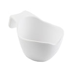A white ceramic sauce boat with smooth, curved edges and an integrated handle at the back, shown against a plain white background. The bowl features a simple, modern design with a slightly irregular rim and is dishwasher safe for easy cleaning.