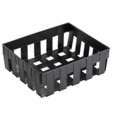 A black rectangular Forge Collection Basket with ventilated sides and bottom, featuring wide vertical and horizontal slats. The basket is empty and positioned on a plain white background, photographed at a slight angle to show depth.