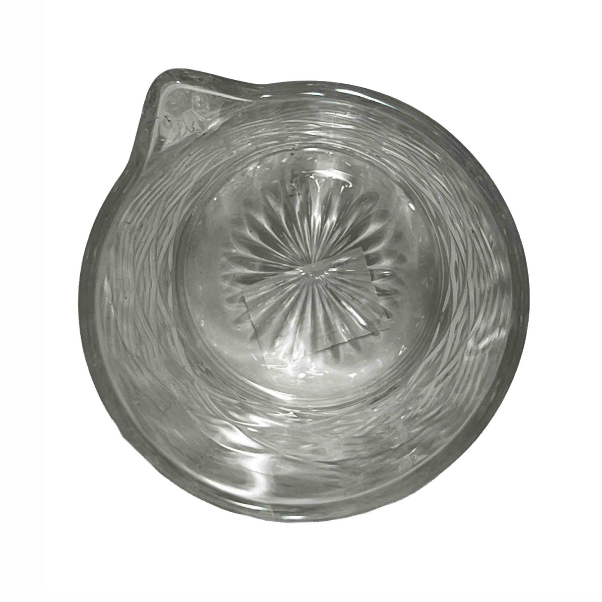 A clear glass citrus juicer from the Waverly Collection features a star-shaped reamer and textured bowl with swirling patterns. This TableCraft piece includes a spout and is viewed from above against a plain white background.