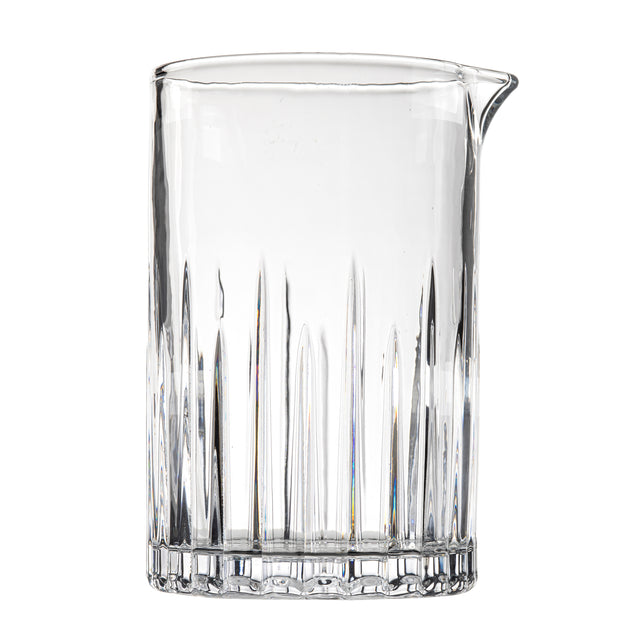 A clear 20 oz mixing glass from the TableCraft Products Waverly Collection, featuring vertical ridges along the lower half, a solid base, and a small spout for pouring. The empty pitcher sits against a plain white background.