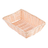A rectangular hand-woven basket, such as the TableCraft 1172W, is shown empty on a white background. Its light beige polypropylene cord woven sides and bottom are slightly angled to highlight the basket's depth and texture.