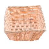 A square, light tan TableCraft 1172W wicker basket with an open top and woven sides and base, photographed against a white background. The basket has slightly curved edges and a simple, natural design.