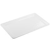 A plain, rectangular serving platter with slightly raised edges is shown against a white background. The tray’s smooth, glossy surface reflects light, suggesting it may be a melamine platter or ceramic. The image is taken from a slight angle.
