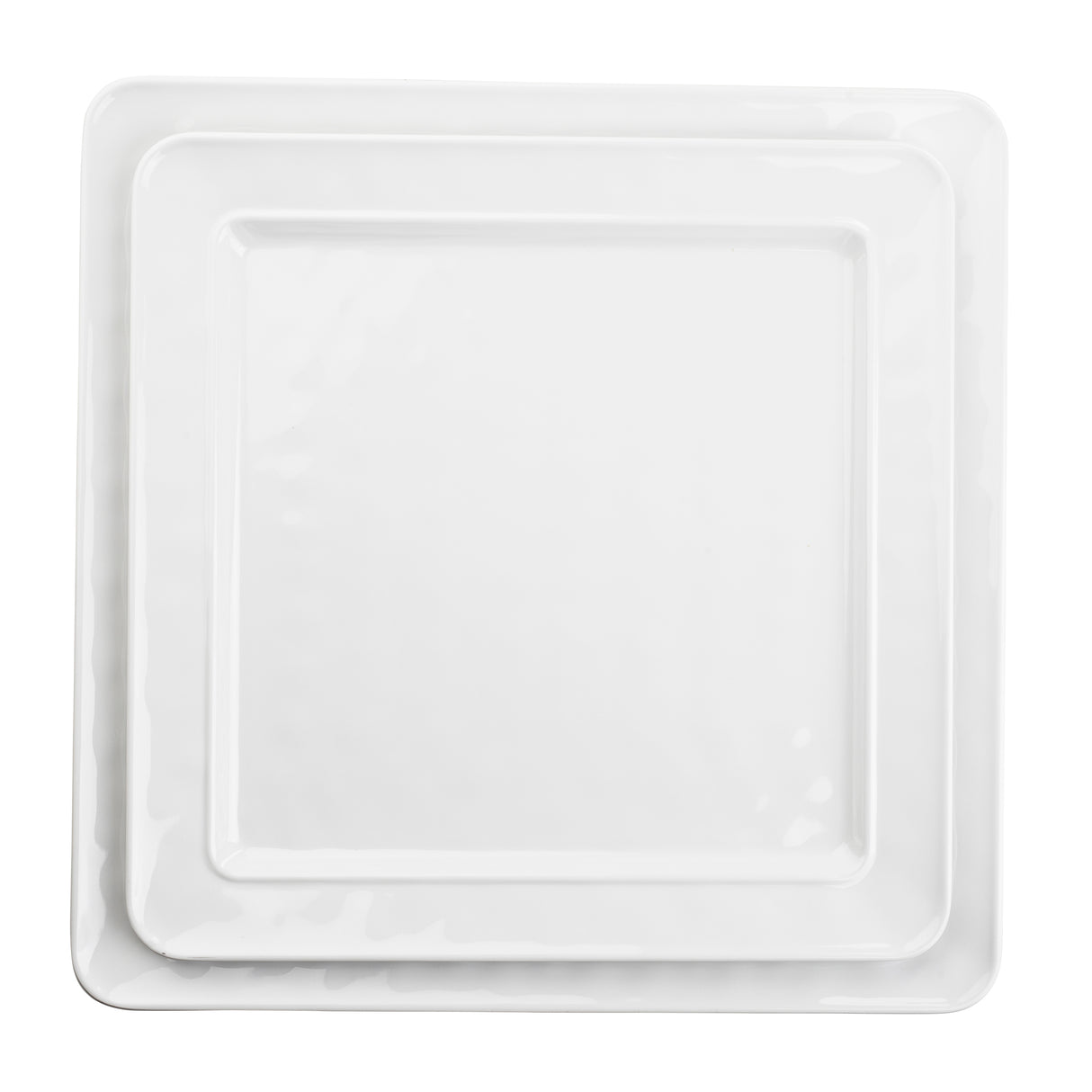 Two clean, white, square ceramic plates from the Ridge Collection are stacked, one smaller and centered on top of the larger plate. Their glossy finish and slightly raised edges highlight a simple, modern design perfect for any serving platter arrangement.