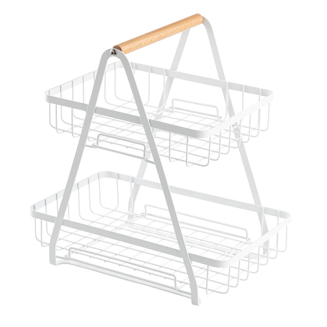 A two-tier display basket crafted from powder coated steel with a rectangular shape, slanted sides, and a wooden handle. The open baskets are spacious and perfect for displaying items. The minimal, modern design suits any space.