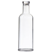 A clear, empty glass carafe with straight sides, a narrow neck, and a flat base. This 34 oz. TableCraft bottle has a cylindrical shape, is topped with a silver or metallic cap, and sits against a plain white background.