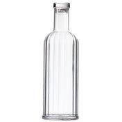 A clear, empty TableCraft glass bottle with a cylindrical shape, straight sides, and a slightly rounded shoulder. This 34 oz carafe has a narrow neck sealed with a round, flat, silver-colored cap against a plain white background.