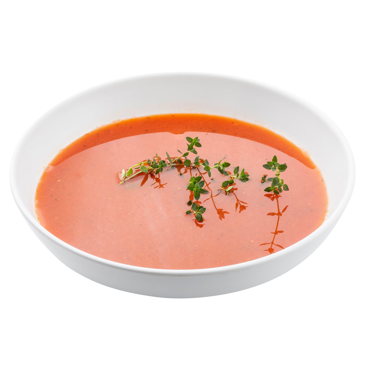A white Terra Collection serving bowl filled with smooth, red tomato soup, garnished with a few sprigs of fresh thyme. The bowl is set against a plain white background, and the soup appears creamy and evenly blended.