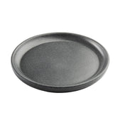 A round, shallow, dark gray TableCraft Terra Collection Serving Plate with a slightly raised edge and smooth, matte, speckled surface sits on a white background. The melamine serving plate appears sturdy and minimalistic in design.