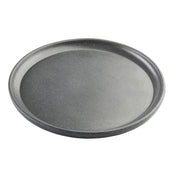A round, flat, black Terra Collection Serving Plate with slightly raised edges and a subtle speckled texture, shown on a white background. The tray appears to be made of stone or ceramic material.