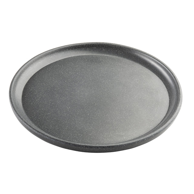 A round, flat, black Terra Collection Serving Plate with slightly raised edges and a subtle speckled texture, shown on a white background. The tray appears to be made of stone or ceramic material.