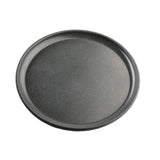 A round, empty, dark gray melamine serving plate from the TableCraft Products Terra Collection features a slightly raised rim and smooth, matte finish. Its subtle speckled pattern gives it a stone-like appearance against a white background.
