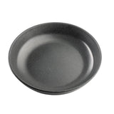 A round, shallow Terra Collection serving bowl with gently sloped sides and a smooth, slightly speckled surface. This 48 oz melamine serving bowl is photographed on a plain white background, highlighting its simple and modern design.