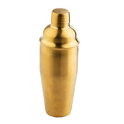 A shiny gold stainless steel cocktail shaker with a rounded cap and smooth, reflective surface stands upright on a plain white background. The 24 oz shaker features a sleek, modern design with gently tapered sides.