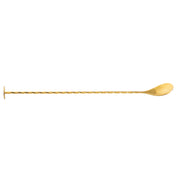 A Gold Bar Spoon with a twisted handle, flat disc on one end, and rounded spoon on the other, crafted from stainless steel. Displayed horizontally on a white background.