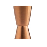 A TableCraft double-sided stainless steel jigger for measuring cocktails, with two conical cups joined at their bases. The larger top cup and smooth metallic finish make it stylish and practical, standing upright on a white background.
