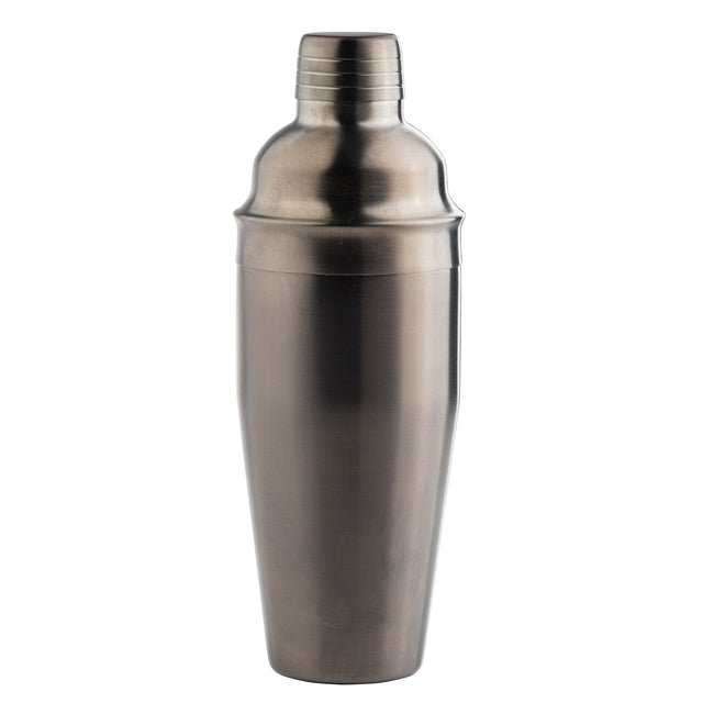 A 24 oz stainless steel cocktail shaker stands upright against a plain white background. The shaker features a smooth, metallic surface with a cap and a slightly wider body that tapers gracefully towards the base.
