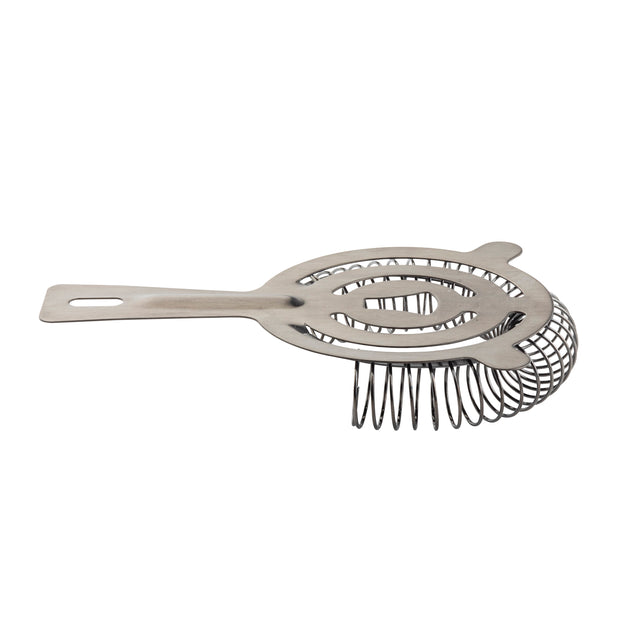 A gunmetal stainless steel cocktail strainer with a flat, slotted handle and a round, perforated center surrounded by a coiled spring, designed for straining ice from mixed drinks. The tool is isolated on a white background.