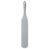 A long, flat, rectangular gray silicone spatula with a narrow handle that widens into a broad blade. The smooth, plain design is crafted from a single piece and features a small hole at the end for hanging.