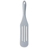 A gray silicone kitchen utensil with a long, straight handle, a small hanging hole at the top, and a flat, rectangular head featuring two long rectangular slots. The spatula, similar to a slotted spurtle, is photographed on a white background.