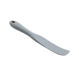 A gray, flat silicone spatula with a slightly curved blade and rounded handle. The handle has a small hole for hanging. This NSF-approved spatula spurtle is photographed on a white background.