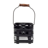 A black metal squeeze bottle caddy with four circular compartments and a sturdy wire handle topped with a brown wooden grip. The slatted base and functional design are inspired by the industrial style of the TableCraft Forge Collection.