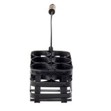 A black metal squeeze bottle caddy with six circular compartments and a tall handle topped with a wooden grip, designed for carrying bottles. Its sturdy, lattice-like structure is photographed against a white background.
