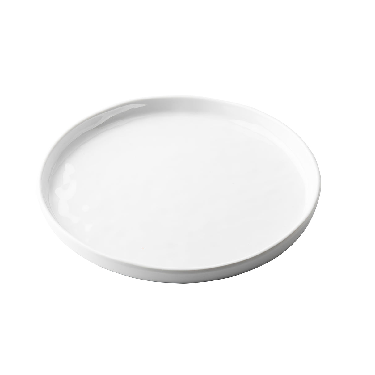 A plain, round, white ceramic plate with a slightly raised edge from the Ridge Collection Serving Plate series, photographed on a white background. The plate is empty and has a smooth, glossy surface.