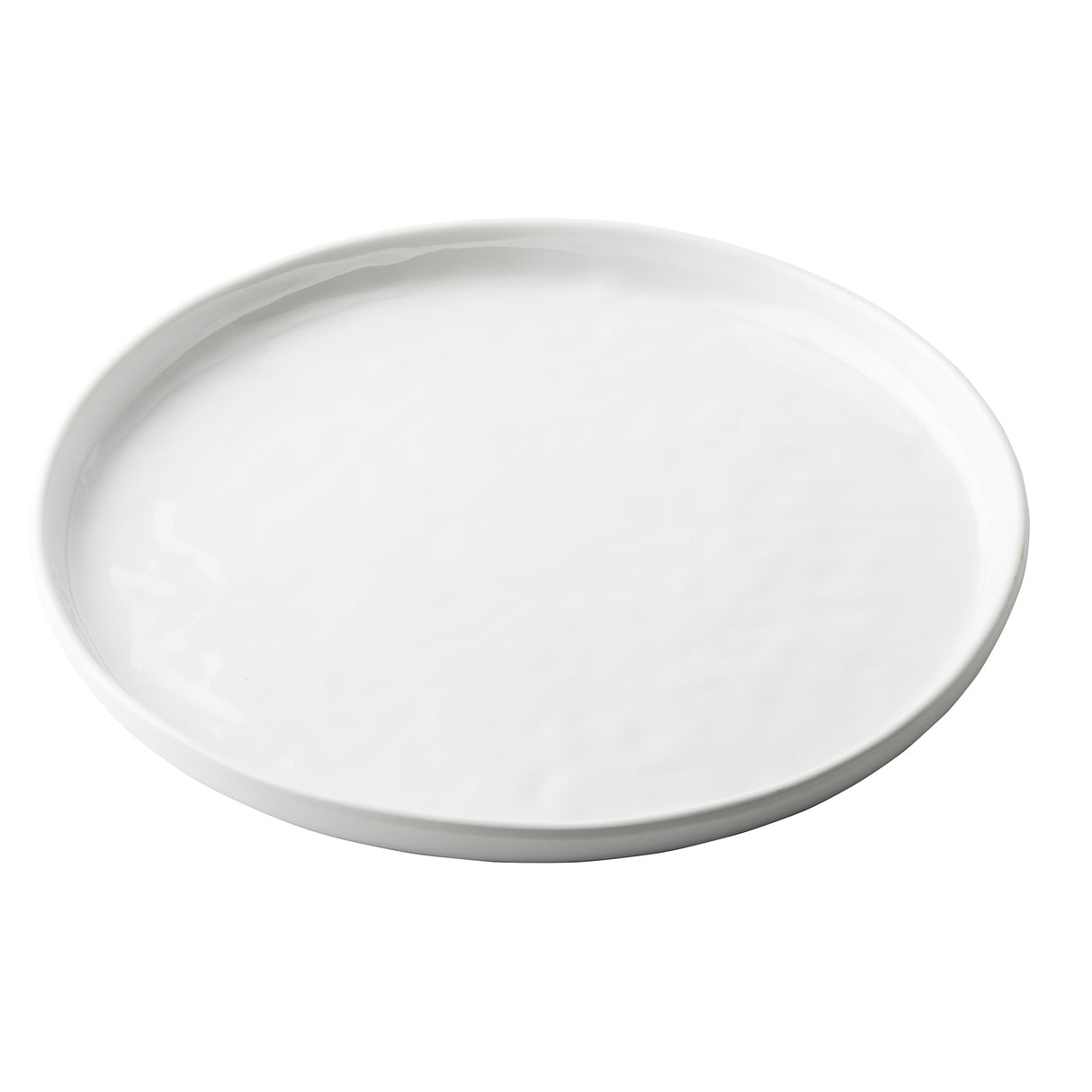 A plain, round white TableCraft Ridge Collection Serving Plate with slightly raised edges, photographed from a slight angle against a white background. The plate’s smooth, glossy surface features no visible patterns or decorations.