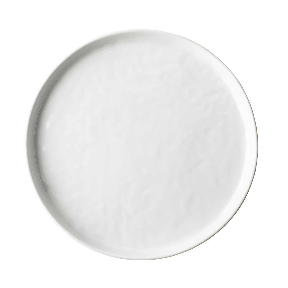A round, white Ridge Collection Serving Plate with a smooth, glossy finish and a slightly raised rim is photographed from above on a plain white background. The plate is empty and unadorned, highlighting its minimalist and clean design.